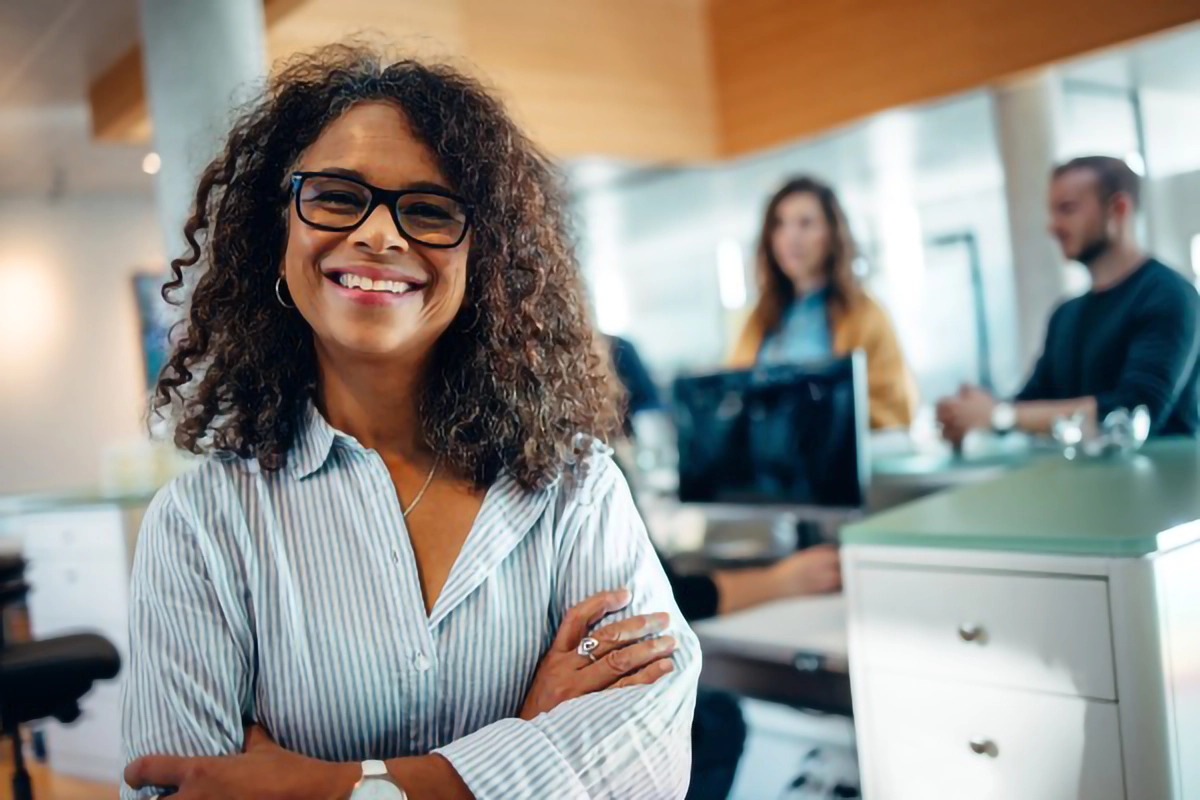 Image of a staff member smilling